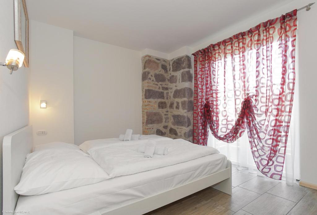 Postel nebo postele na pokoji v ubytování Apartment Residence Veronika
