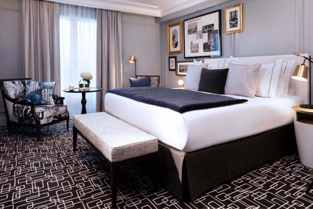 Cama ou camas em um quarto em Le Damantin Hôtel & Spa