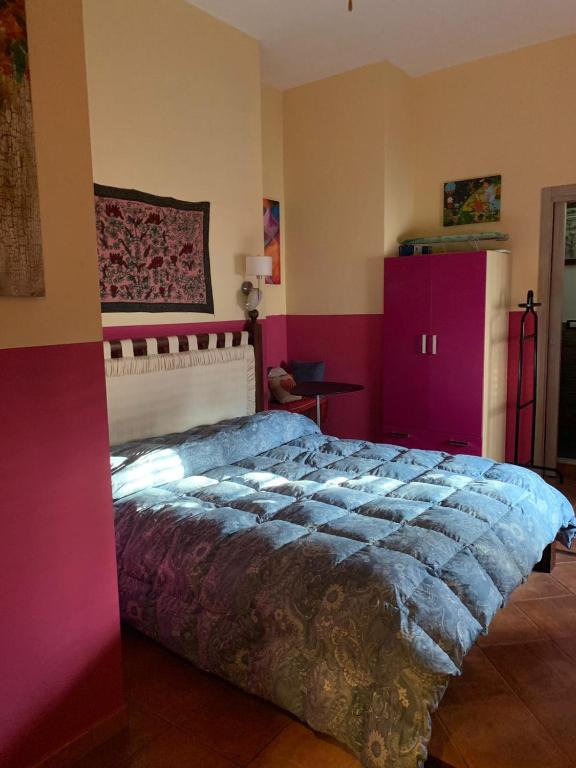 Postel nebo postele na pokoji v ubytování Mondello Room