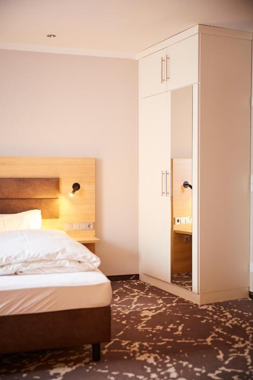 Postel nebo postele na pokoji v ubytování Bed&Breakfast Erber