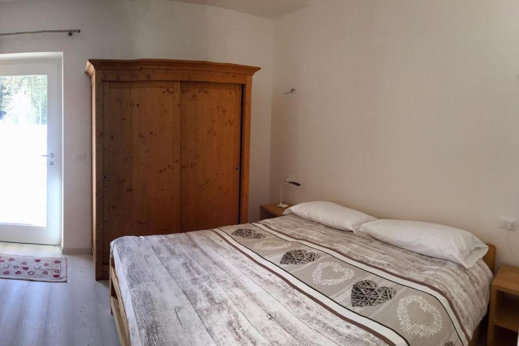 Posteľ alebo postele v izbe v ubytovaní Agriturismo Moiè