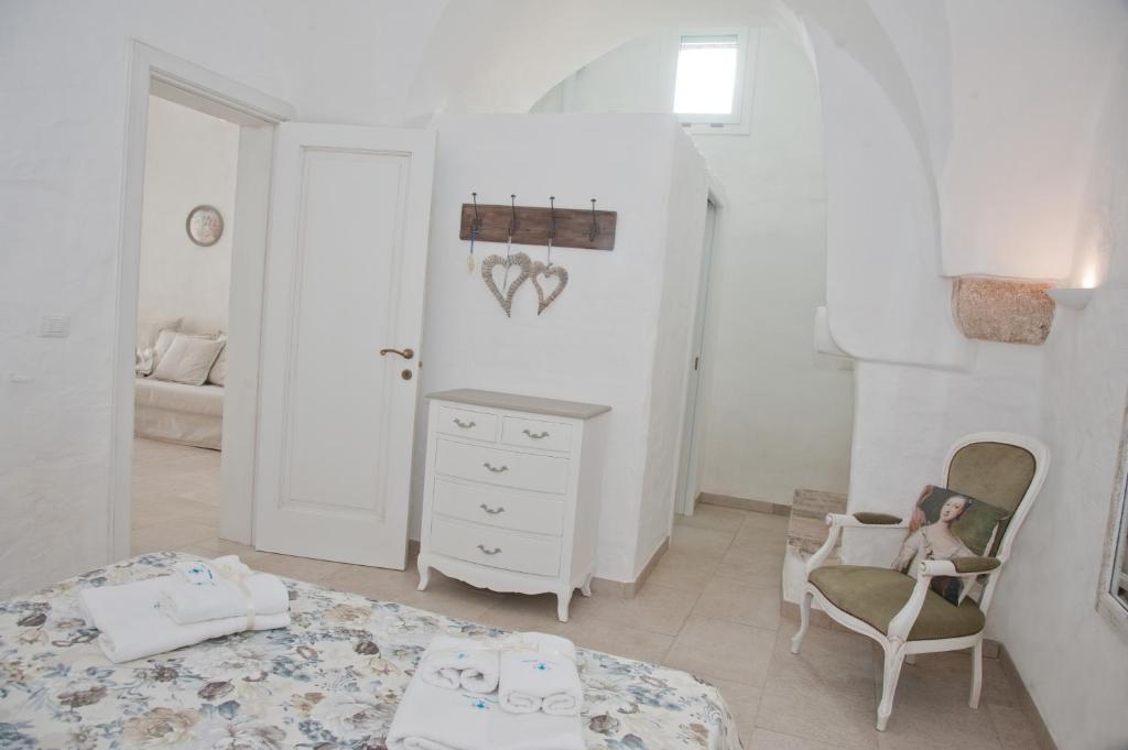Postel nebo postele na pokoji v ubytování Nonna Mina