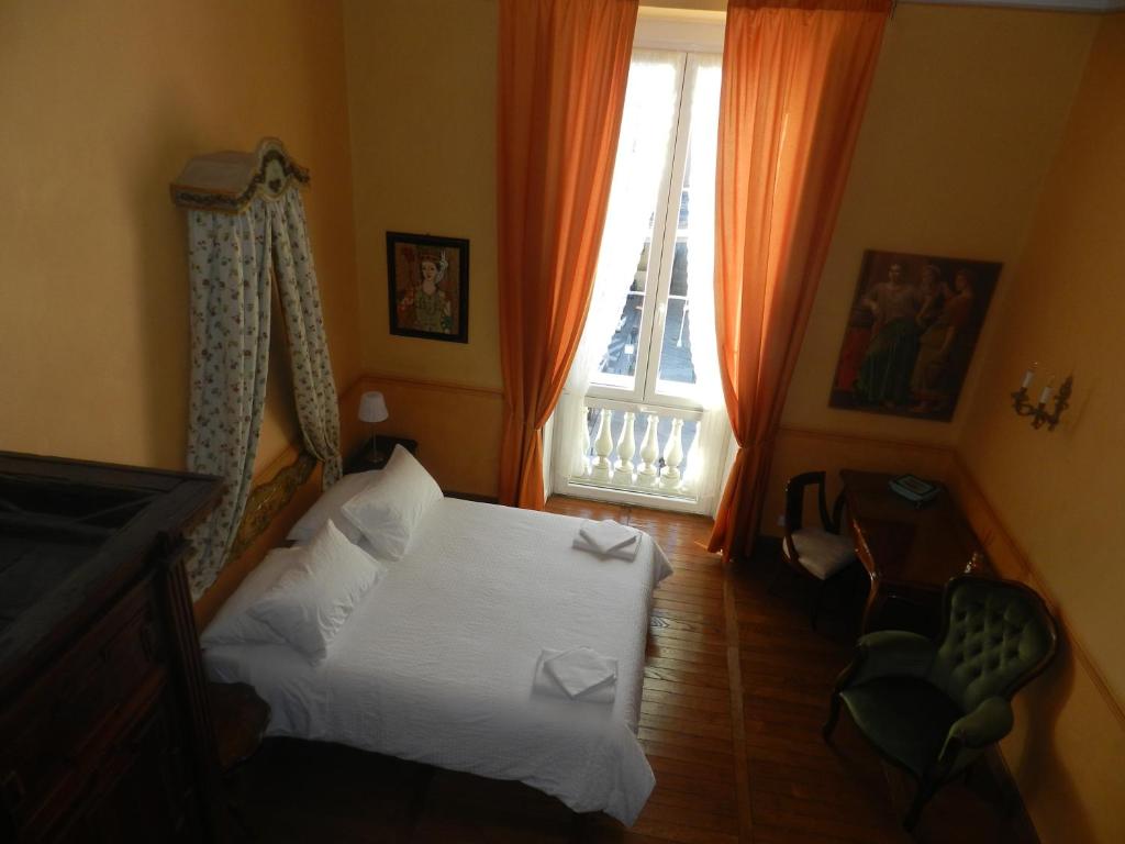 Postel nebo postele na pokoji v ubytování Bigo Guest House