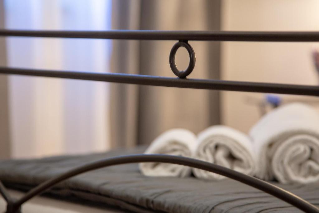 Postel nebo postele na pokoji v ubytování Holiday Rooms Portale Pirrera