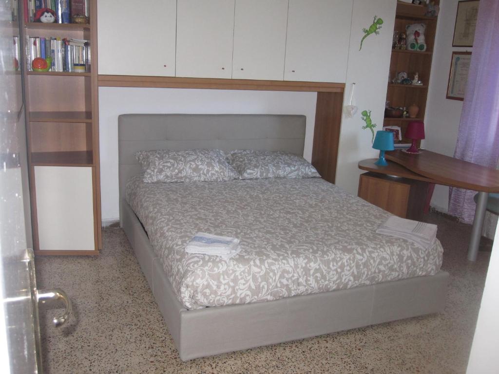 Postel nebo postele na pokoji v ubytování Residence Luisa