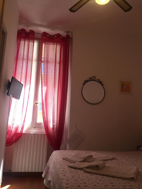 Łóżko lub łóżka w pokoju w obiekcie Hotel Villa Cristina