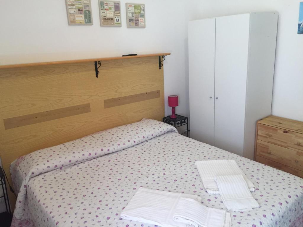Łóżko lub łóżka w pokoju w obiekcie Hotel Villa Cristina