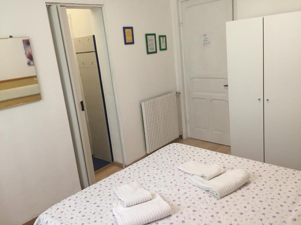 Łóżko lub łóżka w pokoju w obiekcie Hotel Villa Cristina