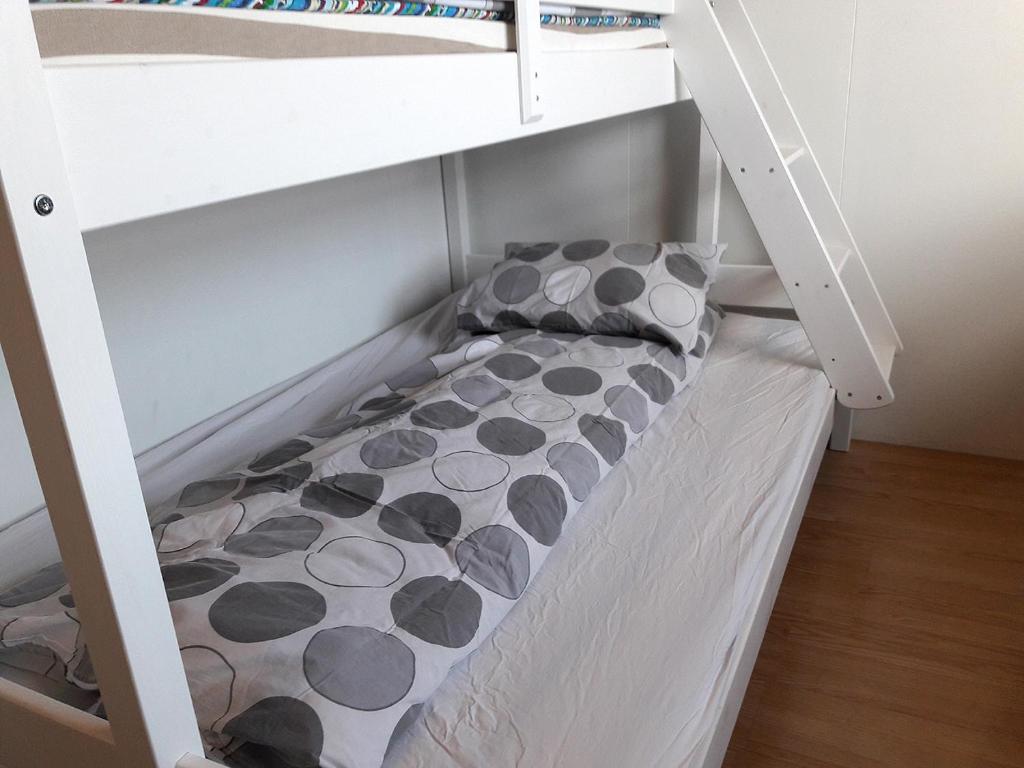 Postel nebo postele na pokoji v ubytování Fornhagi 2