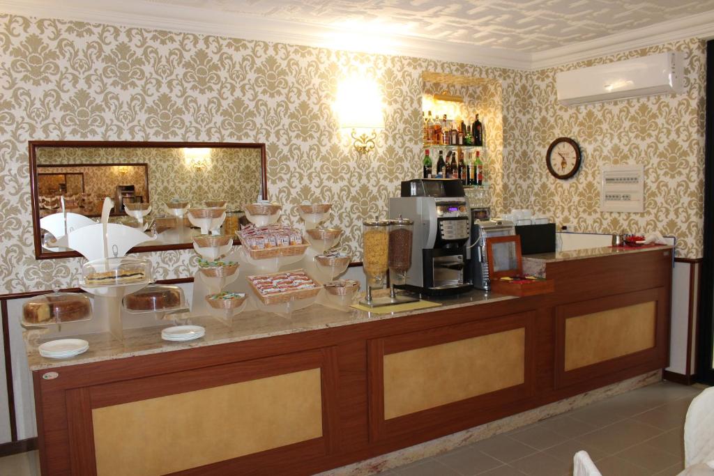 Příslušenství pro přípravu čaje a kávy v ubytování Hotel Nespolo D'Oro