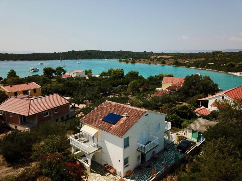 an aerial view of a house next to a river at Apartment NECA in Lovište
