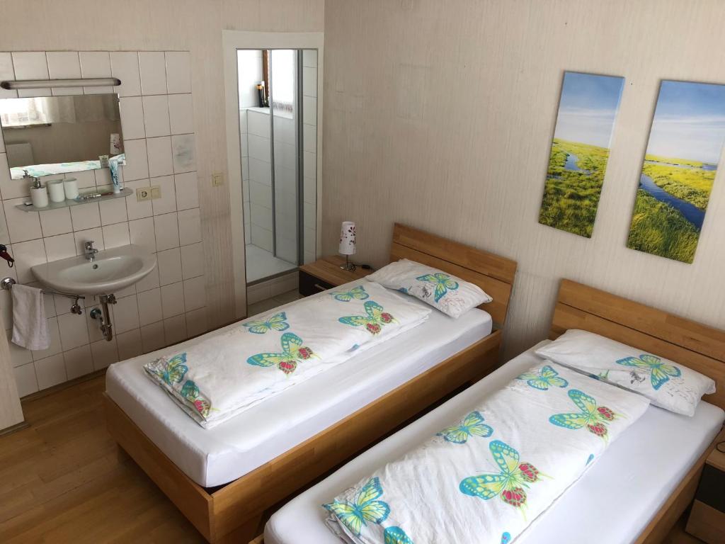 Postel nebo postele na pokoji v ubytování Wei Wei's Hostel
