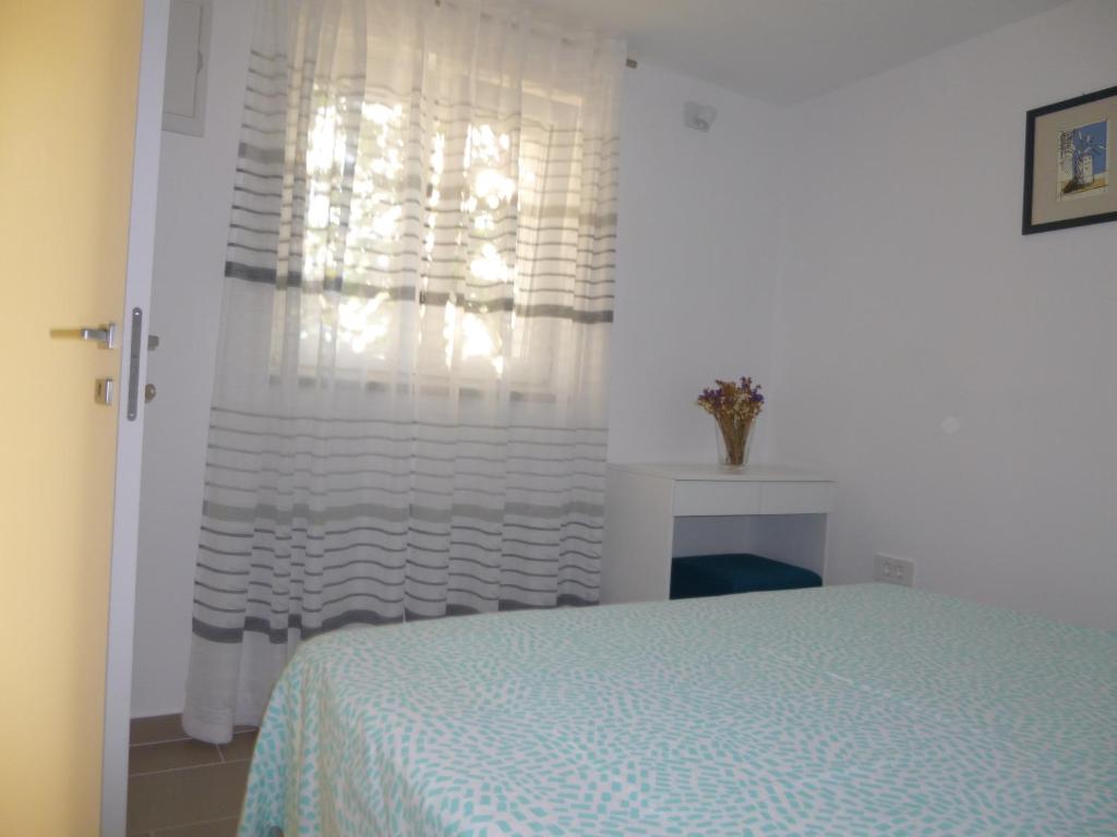 Postel nebo postele na pokoji v ubytování Apartment Marija