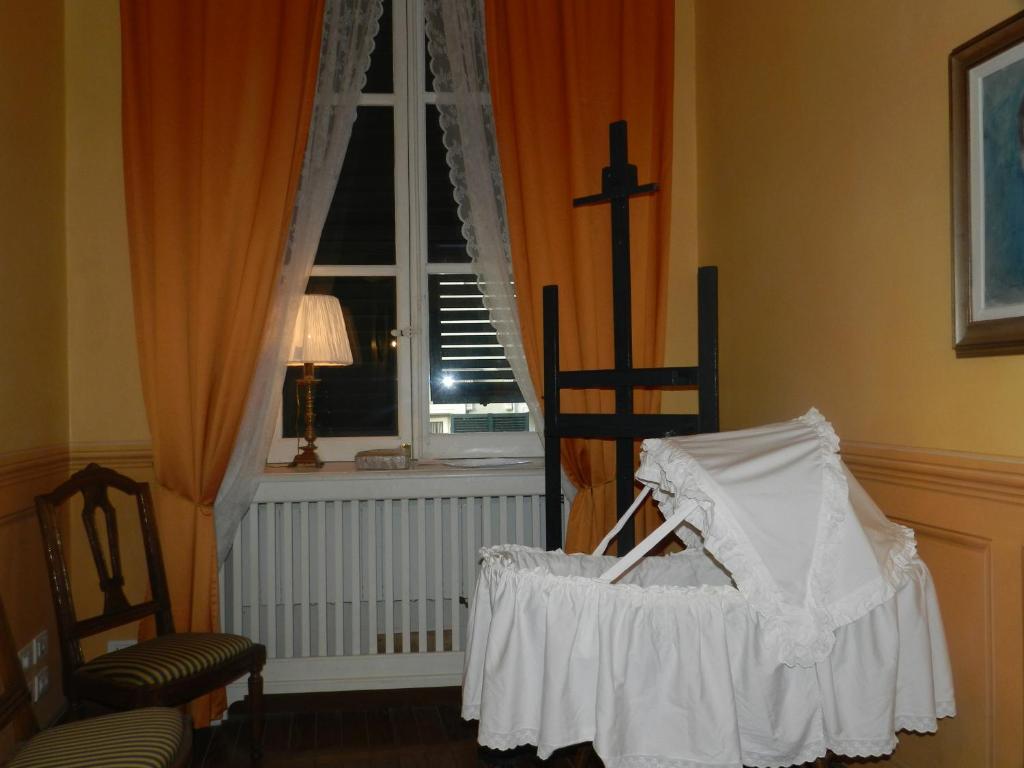 Postel nebo postele na pokoji v ubytování Bigo Guest House