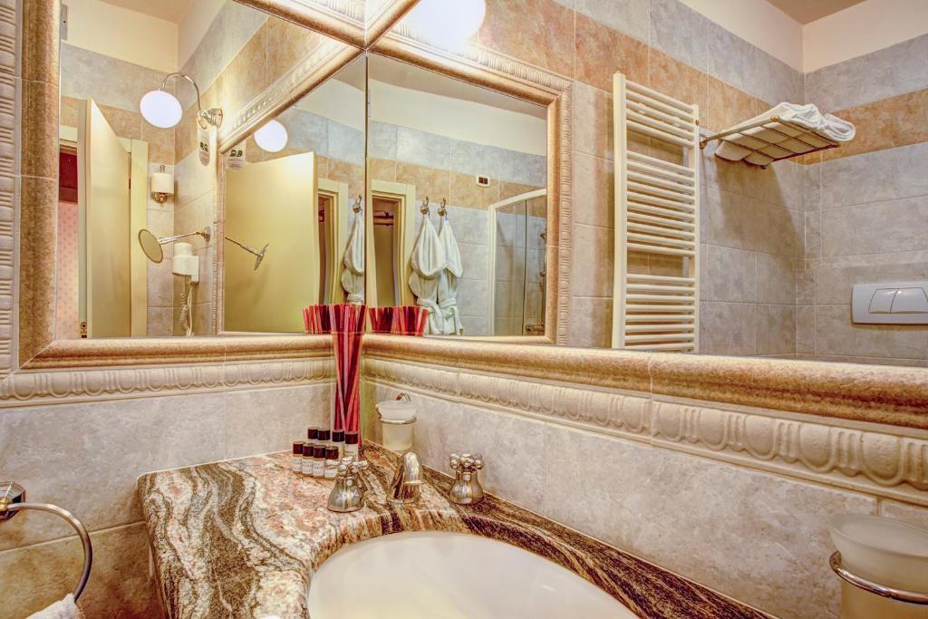 Koupelna v ubytování Hotel La Locanda