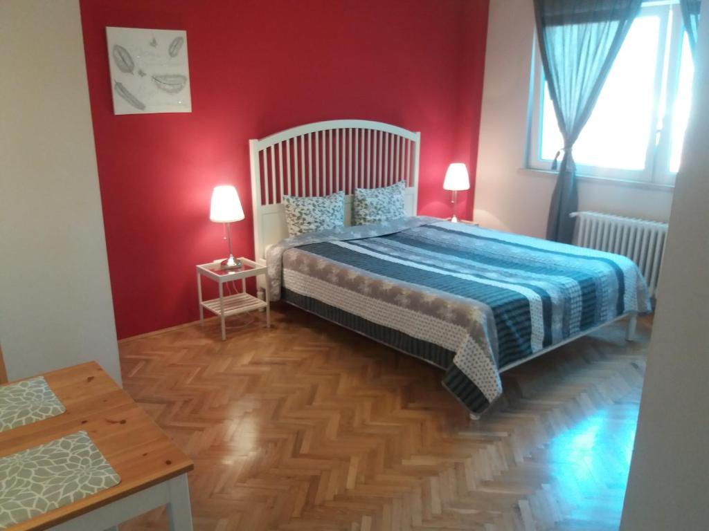 Posteľ alebo postele v izbe v ubytovaní Budanest Apartments