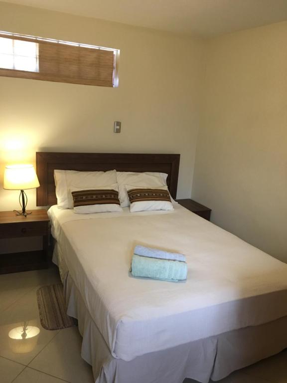 Voodi või voodid majutusasutuse Hostal Anpaymi Atacama toas
