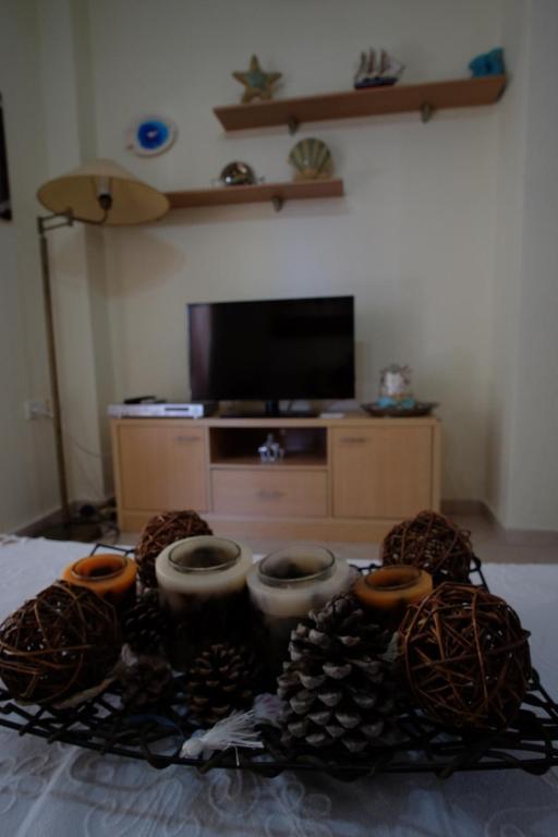 Televízia a/alebo spoločenská miestnosť v ubytovaní Billias House