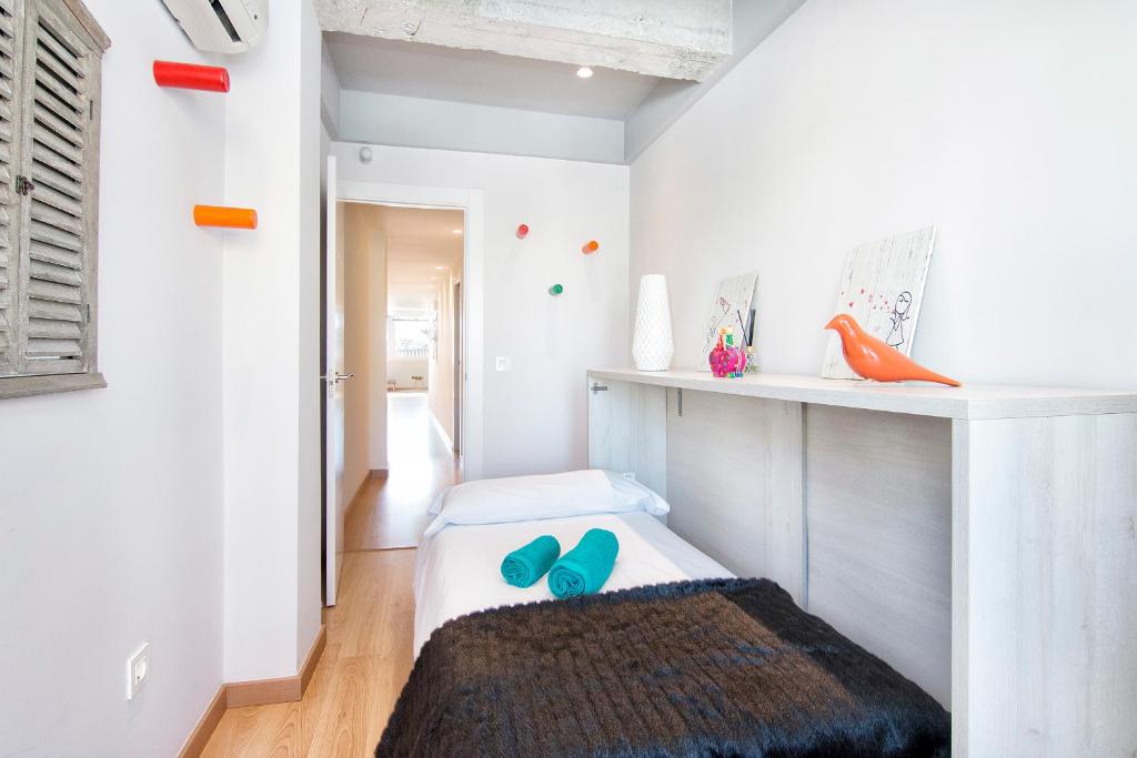 Cama o camas de una habitación en tuGuest Clave de Sol Apartment