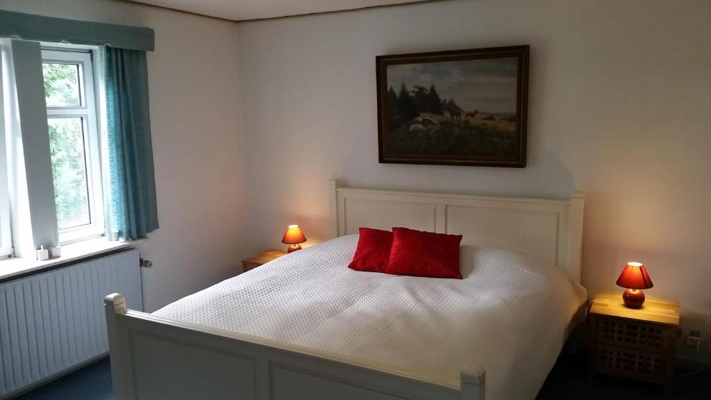 Postel nebo postele na pokoji v ubytování Gørdinglund Manorhouse Mainbuilding