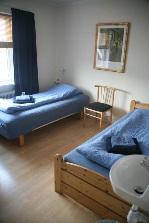 Postel nebo postele na pokoji v ubytování 62N Guesthouse - City Center