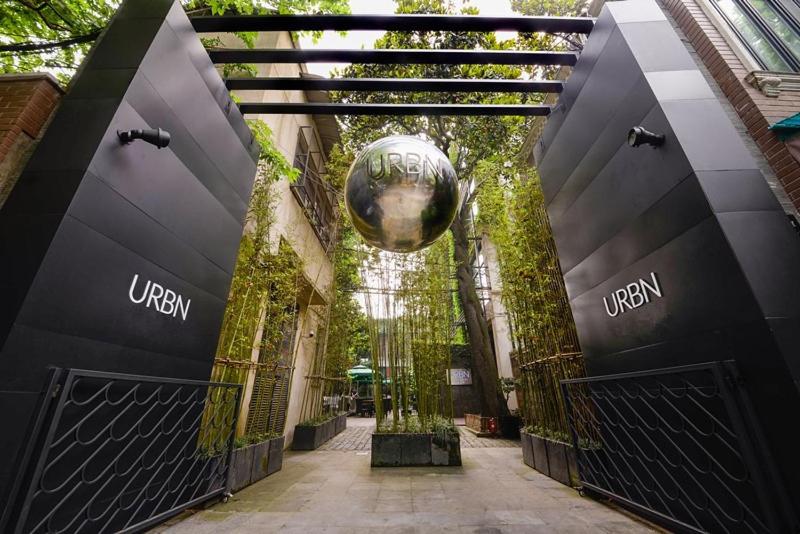 a entrance to a building with a ball on it at URBN Boutique Shanghai in Shanghai