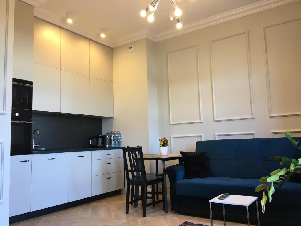 Kuchyň nebo kuchyňský kout v ubytování Apartamenty Platinum Loft