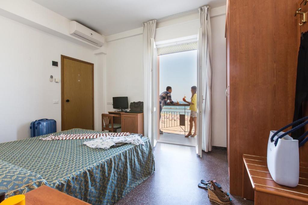TV a/nebo společenská místnost v ubytování Hotel International