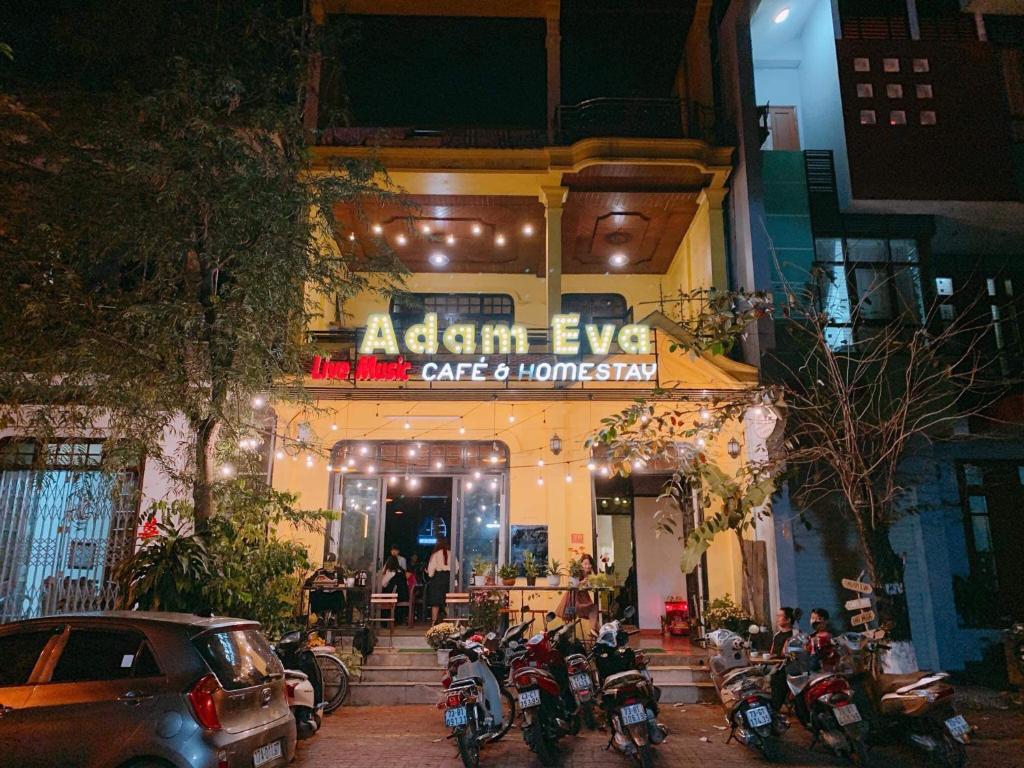 a group of motorcycles parked in front of a building at Adam Eva Homestay in Dong Hoi