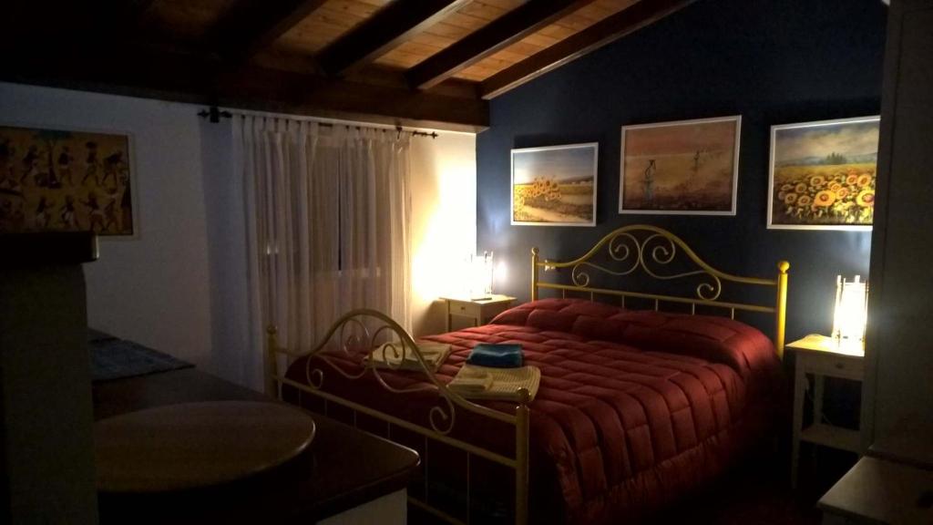 Postel nebo postele na pokoji v ubytování I tre campanili sull'Etna