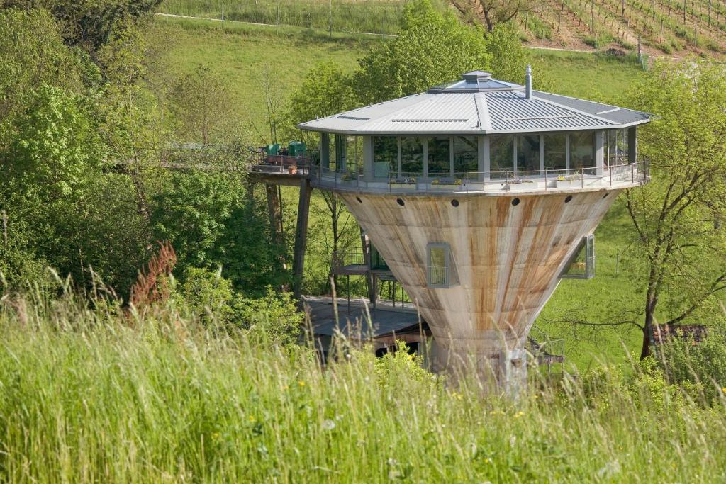 a observation tower in the middle of a field at Bergwerksilo Herznach in Herznach