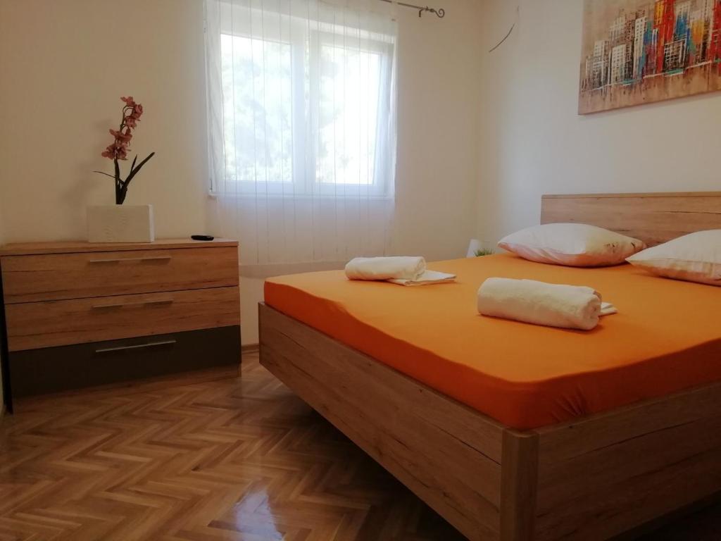 Postel nebo postele na pokoji v ubytování Apartman Marica