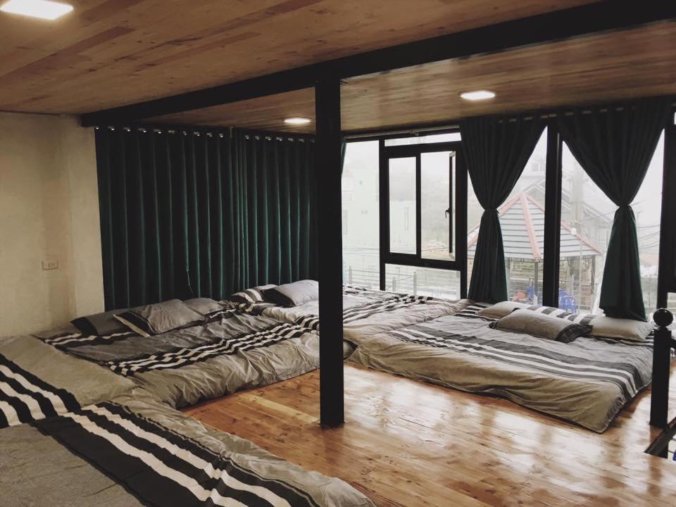 En eller flere senge i et værelse på Bách Xanh House. Nhà Gác Lửng