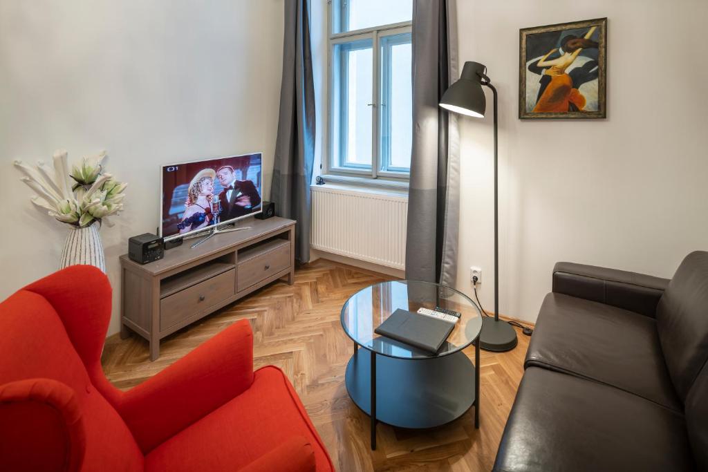 TV a/nebo společenská místnost v ubytování Old Town - Skorepka Apartments