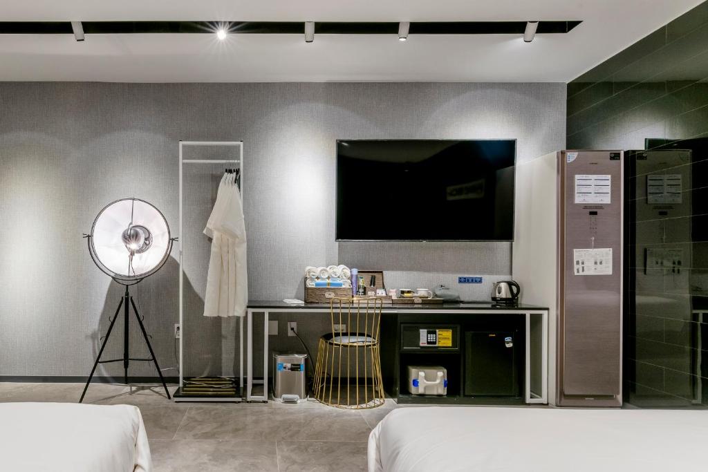 TV a/nebo společenská místnost v ubytování Air Sky Hotel