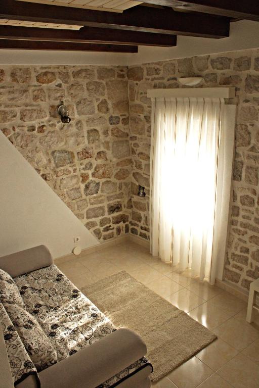 Postel nebo postele na pokoji v ubytování Apartment La Perla A2 BOL-CENTER