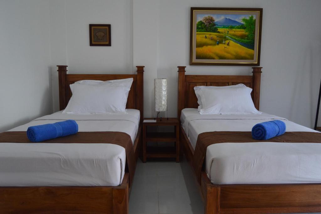 Postel nebo postele na pokoji v ubytování Askara Guest House & Hostel