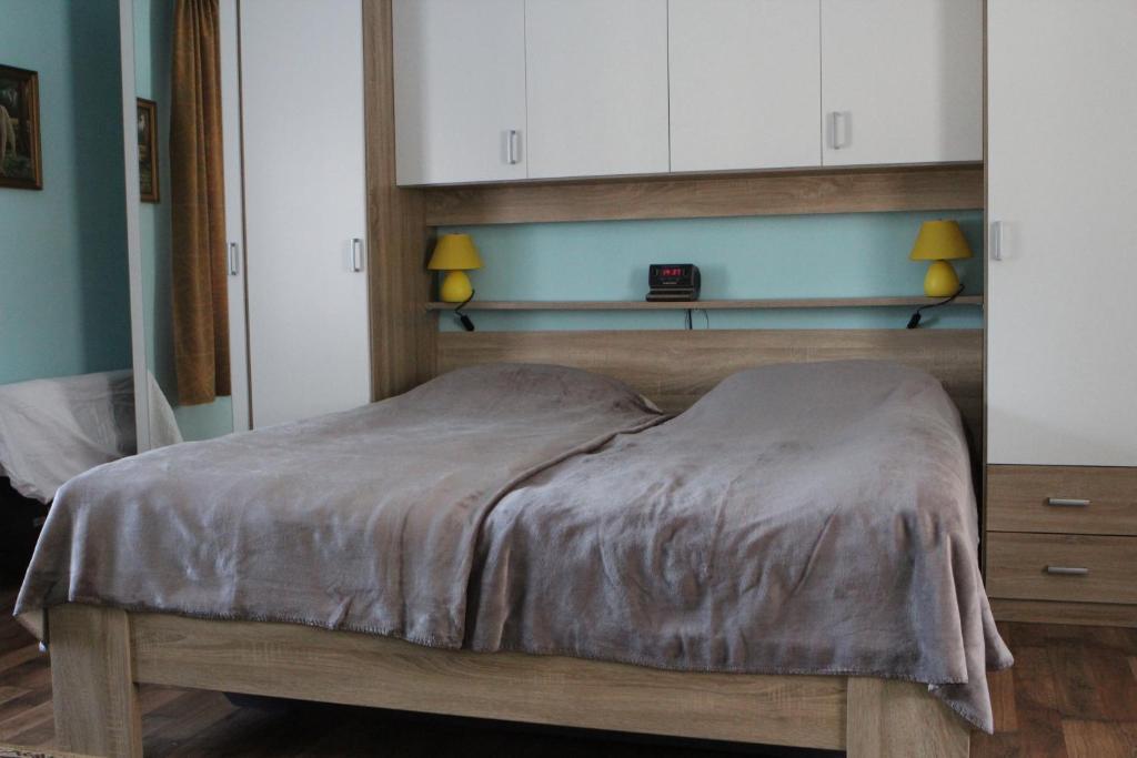 Postel nebo postele na pokoji v ubytování Apartma Lipa