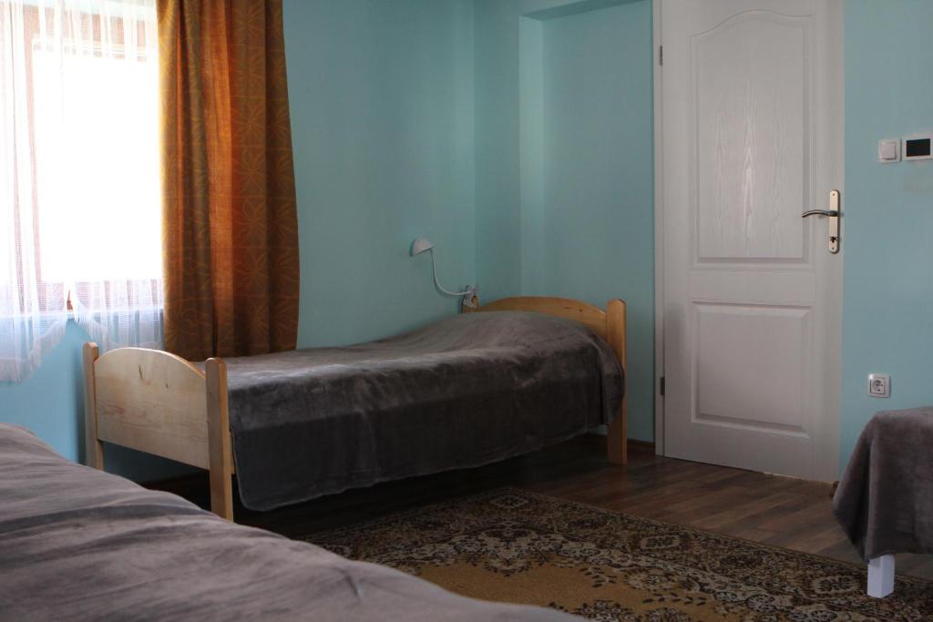 Postel nebo postele na pokoji v ubytování Apartma Lipa