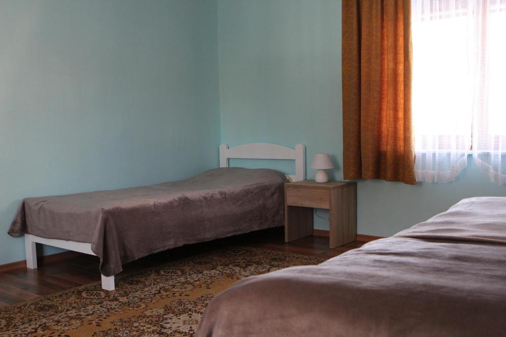 Postel nebo postele na pokoji v ubytování Apartma Lipa