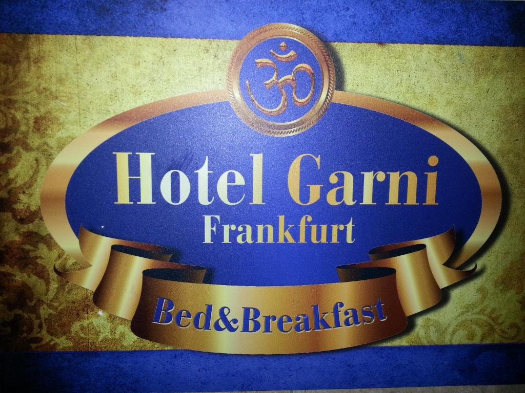 a sign for a hotel camillinraud restaurant with a ribbon at Hotelgarni Frankfurt in Frankfurt/Main