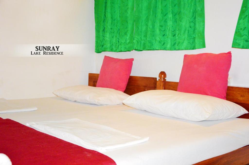 Postel nebo postele na pokoji v ubytování Sunray Lake Residence