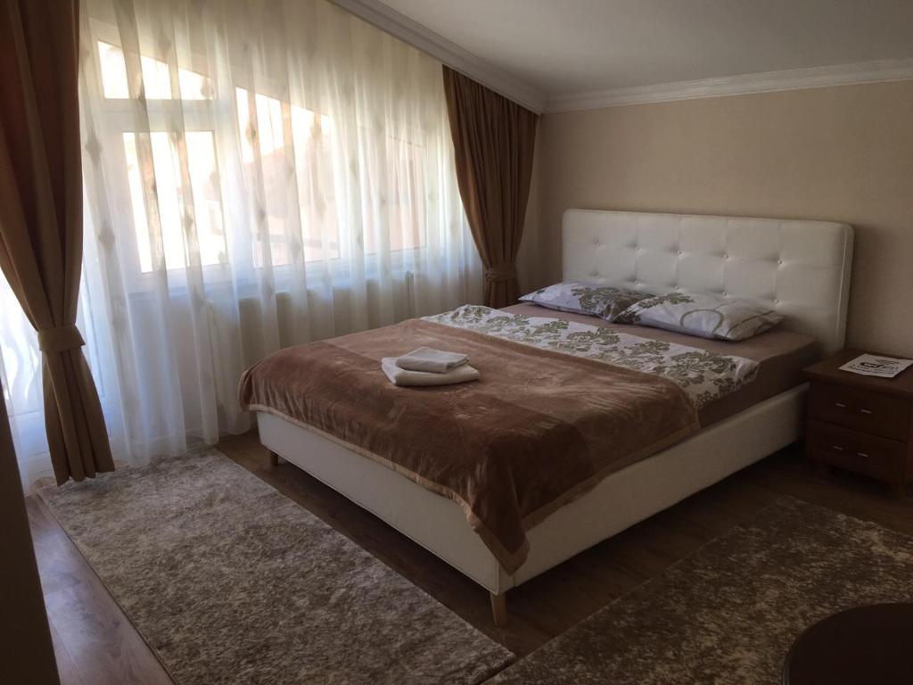 Ліжко або ліжка в номері Apartment Perla