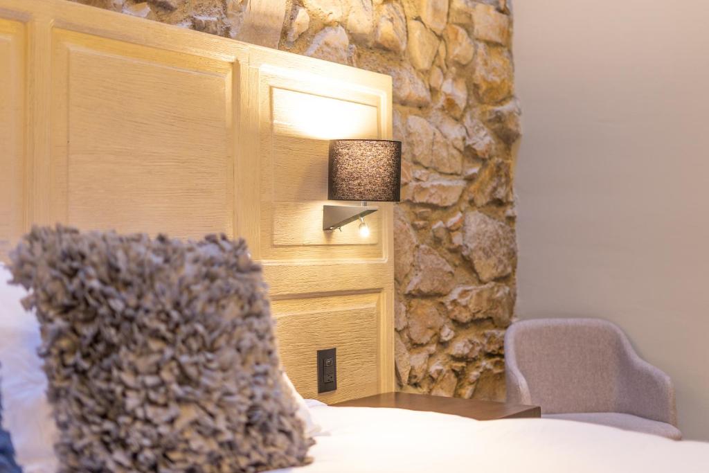 Postel nebo postele na pokoji v ubytování Hotel Casa Once