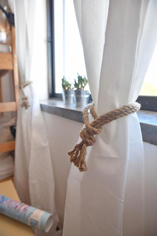 Postel nebo postele na pokoji v ubytování Surf House Peniche