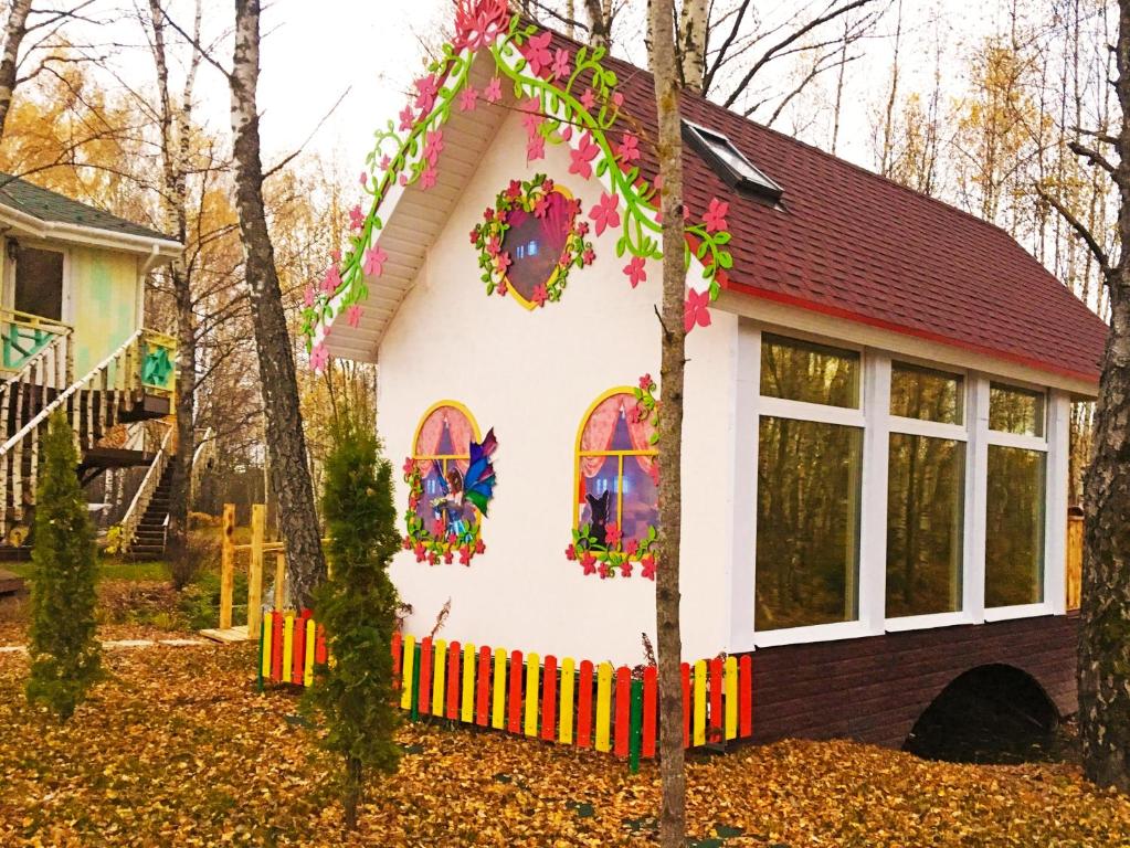 a play house made out of a tree at Fairy house in Petrovo
