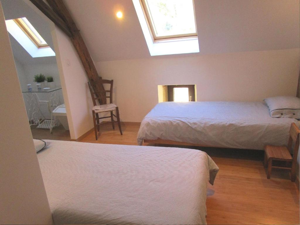 Postel nebo postele na pokoji v ubytování Gîte de vacances La Melve