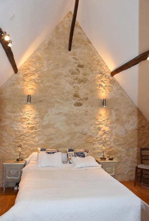 Postel nebo postele na pokoji v ubytování Gîte de vacances La Melve