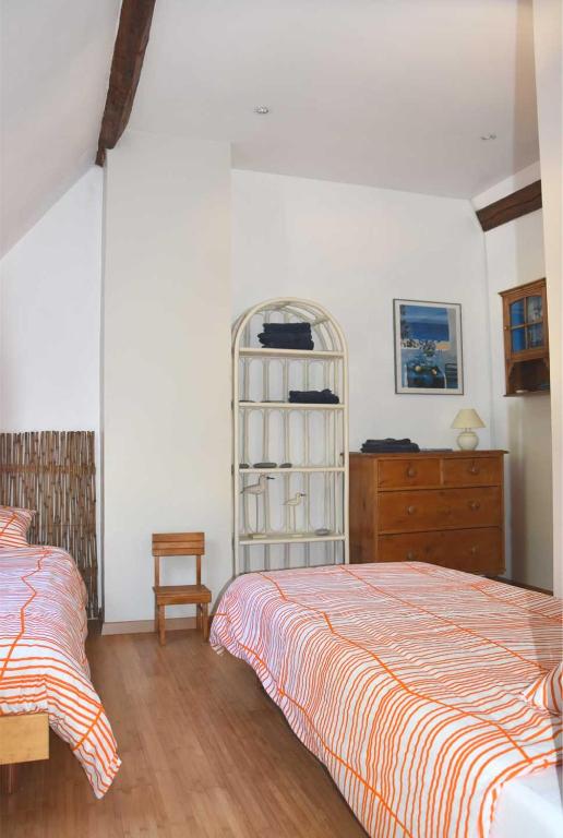 Postel nebo postele na pokoji v ubytování Gîte de vacances La Melve