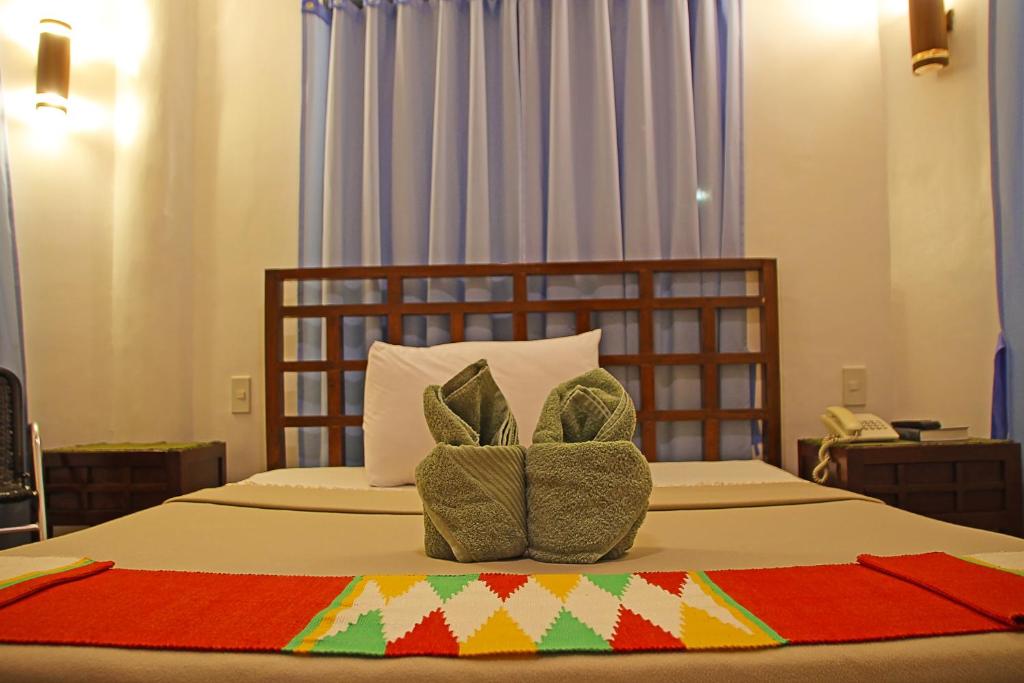 Postel nebo postele na pokoji v ubytování Coron Hilltop View Resort